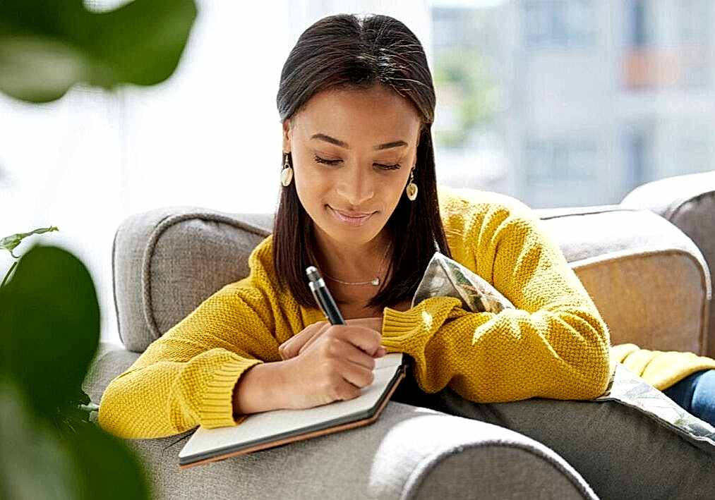 lady writing wedding vows for her special day